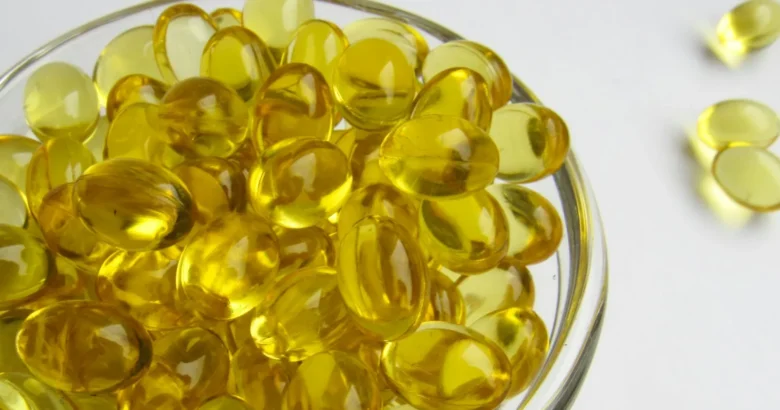 Cápsulas de vitamina D em um pote de vidro